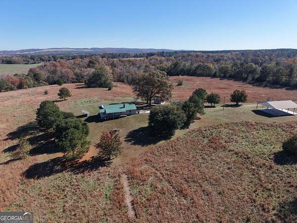 65.4 Acres of Land with Home for Sale in Woodbury, Georgia