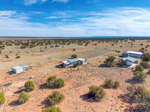 118 Acres of Recreational Land with Home for Sale in Concho, Arizona