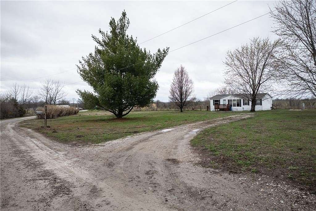 4.78 Acres of Land with Home for Sale in Warrensburg, Missouri