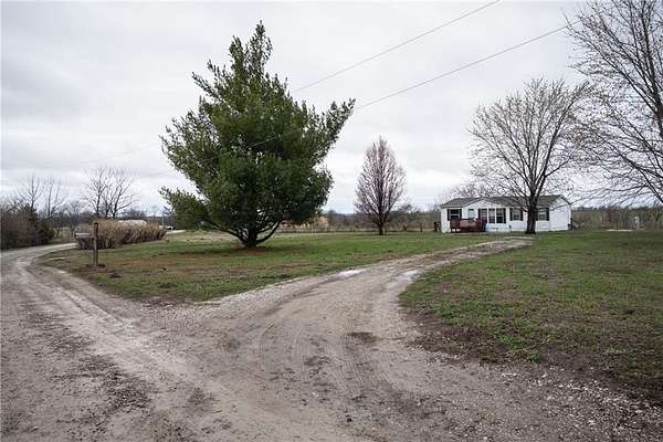 4.78 Acres of Land with Home for Sale in Warrensburg, Missouri