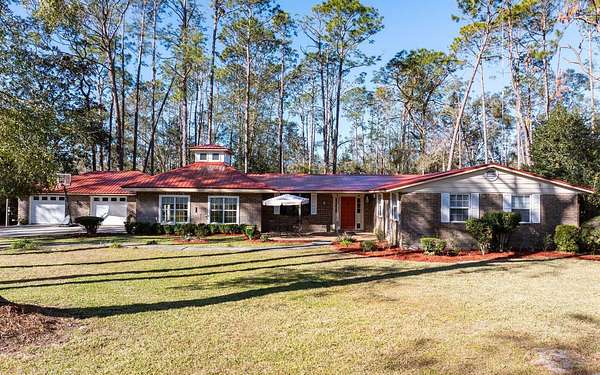 2.62 Acres of Land with Home for Sale in Live Oak, Florida