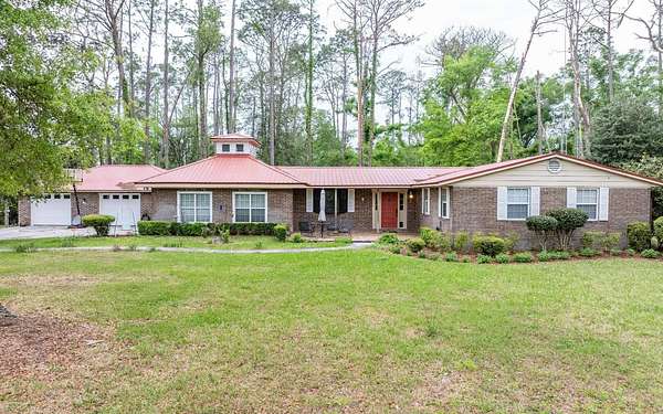 2.62 Acres of Land with Home for Sale in Live Oak, Florida