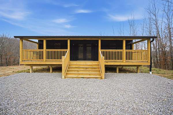 5.5 Acres of Land with Home for Sale in McArthur, Ohio