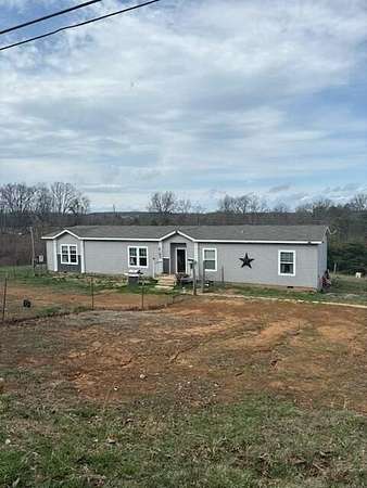 17 Acres of Land with Home for Sale in Waco, Kentucky