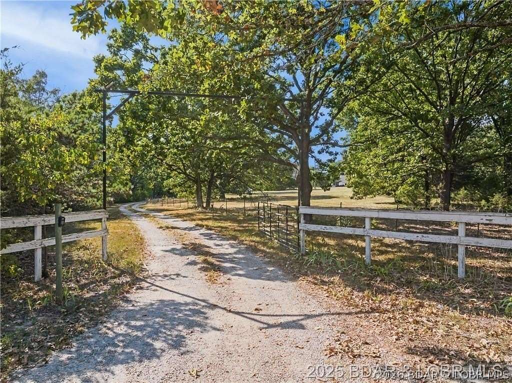 20.8 Acres of Agricultural Land with Home for Sale in Montreal, Missouri