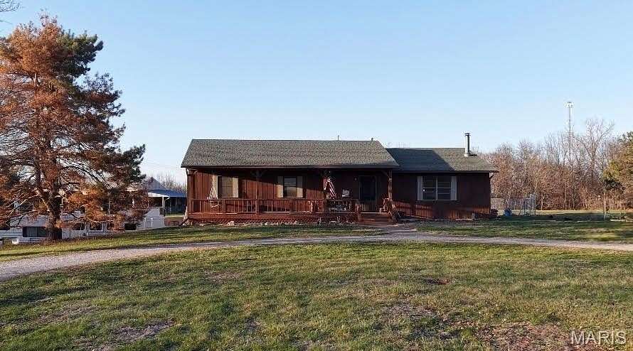 26.6 Acres of Agricultural Land with Home for Sale in Hannibal, Missouri