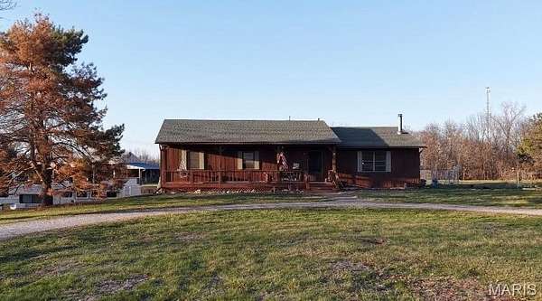 26.6 Acres of Agricultural Land with Home for Sale in Hannibal, Missouri