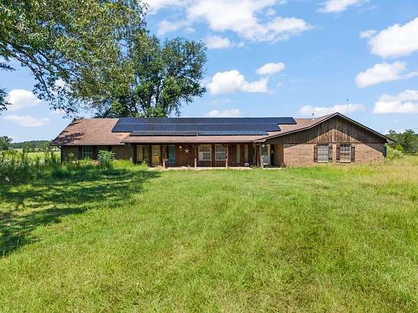7.36 Acres of Land with Home for Sale in Gilmer, Texas