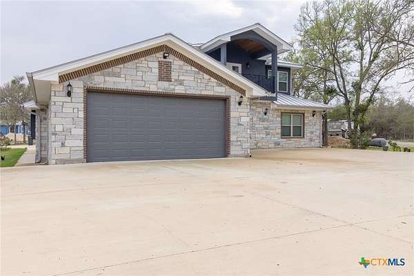 2.6 Acres of Land with Home for Sale in Cedar Creek, Texas