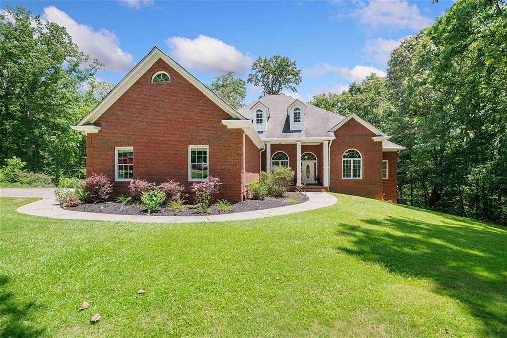 3.26 Acres of Land with Home for Sale in Ball Ground, Georgia