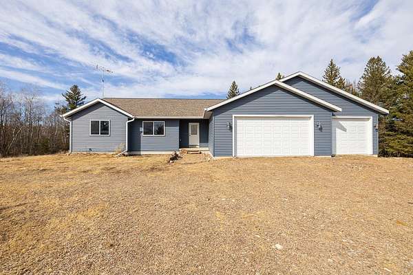 18 Acres of Land with Home for Sale in Holcombe, Wisconsin