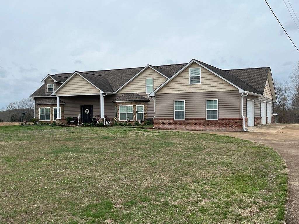 56.3 Acres of Recreational Land with Home for Sale in Henry, Tennessee