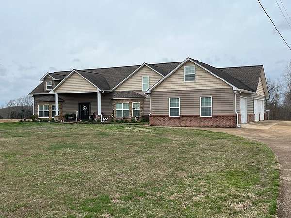 56.3 Acres of Recreational Land with Home for Sale in Henry, Tennessee