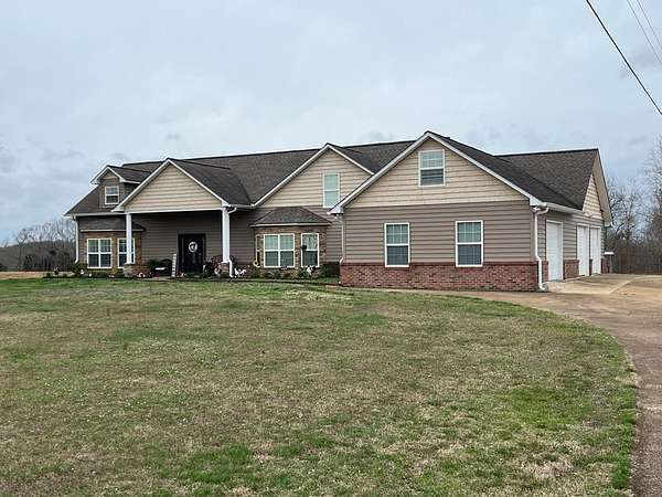 56.3 Acres of Recreational Land with Home for Sale in Henry, Tennessee