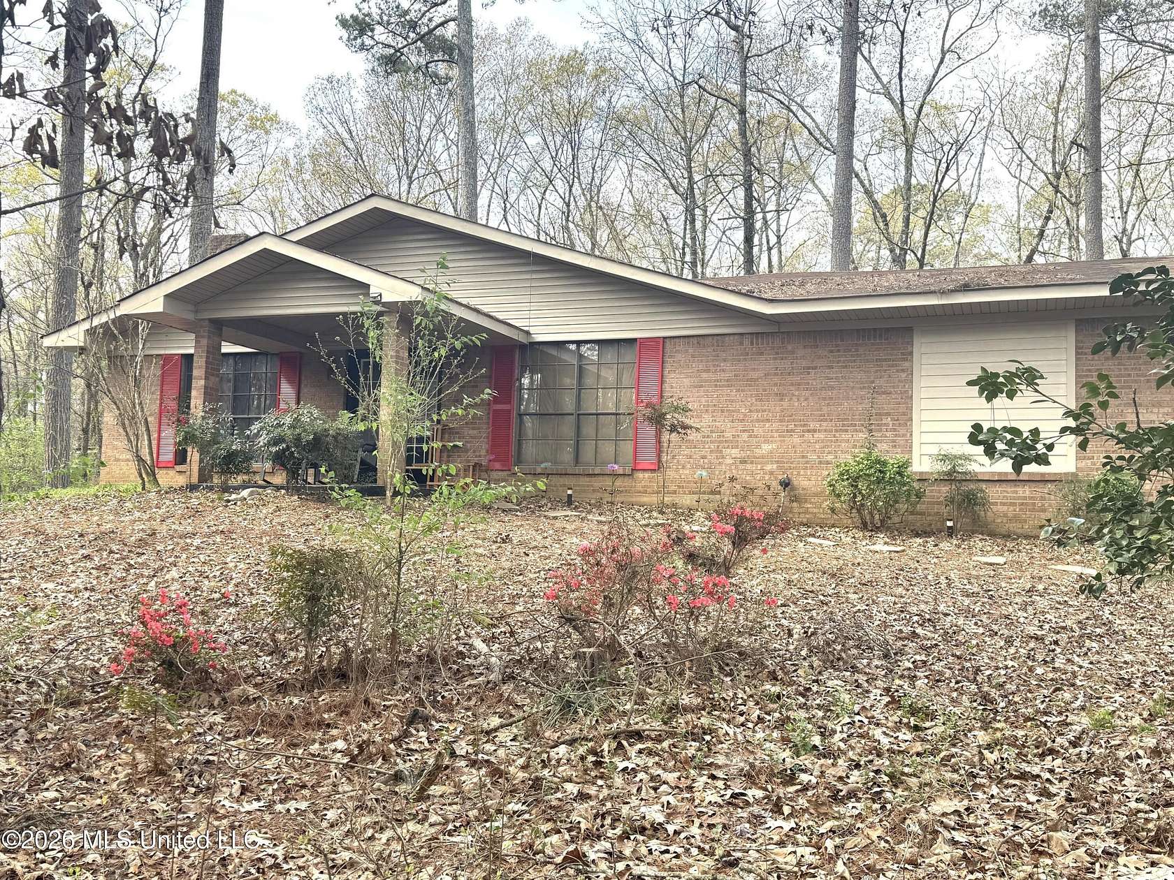 6.4 Acres of Land with Home for Sale in Canton, Mississippi