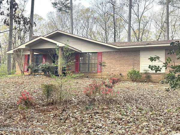 6.4 Acres of Land with Home for Sale in Canton, Mississippi