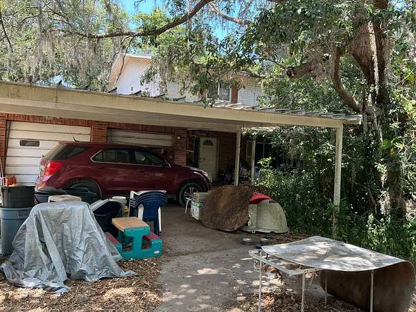 2.55 Acres of Land with Home for Auction in Zephyrhills, Florida