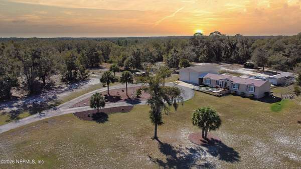 2.88 Acres of Land with Home for Sale in Pomona Park, Florida