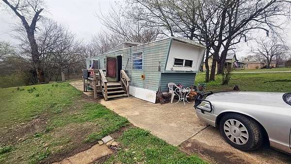 0.78 Acres of Land with Home for Sale in Yellville, Arkansas