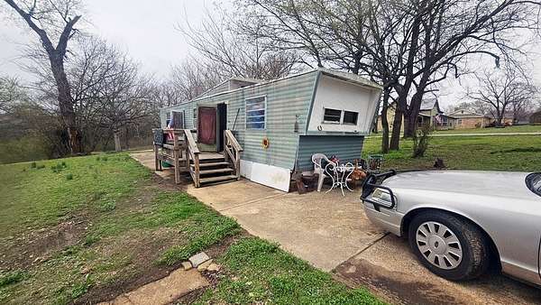 0.78 Acres of Land with Home for Sale in Yellville, Arkansas