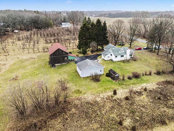 14 Acres of Land with Home for Sale in Belmont, Michigan