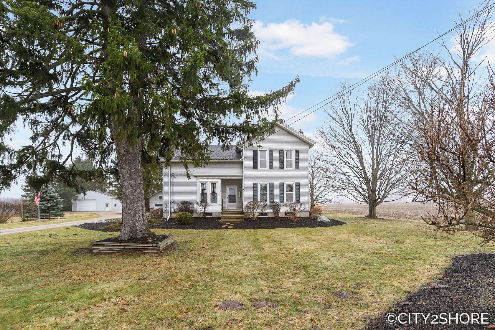 8 Acres of Land with Home for Sale in Sparta, Michigan