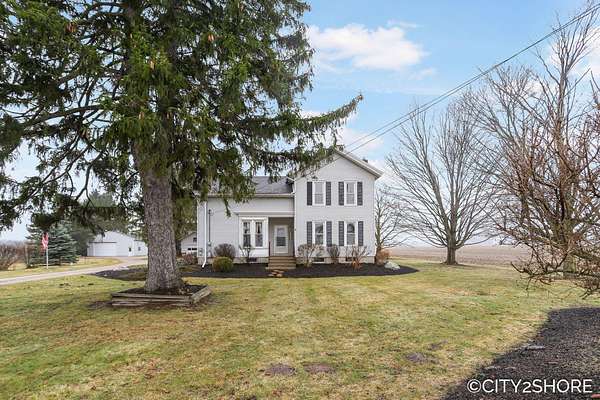 8 Acres of Land with Home for Sale in Sparta, Michigan