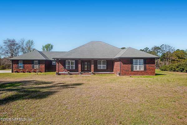 14.2 Acres of Land with Home for Sale in Hilliard, Florida