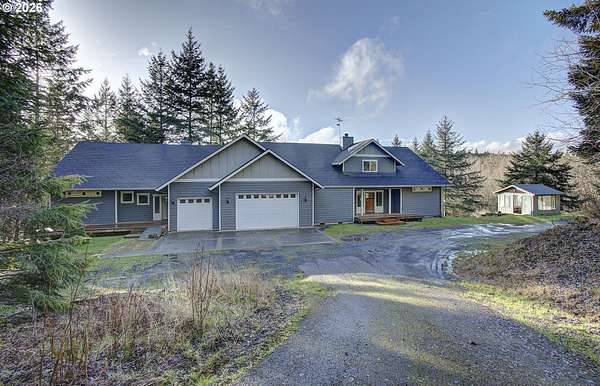 50 Acres of Recreational Land with Home for Sale in Deer Island, Oregon