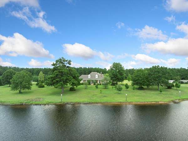 20 Acres of Land with Home for Sale in Columbia, Mississippi