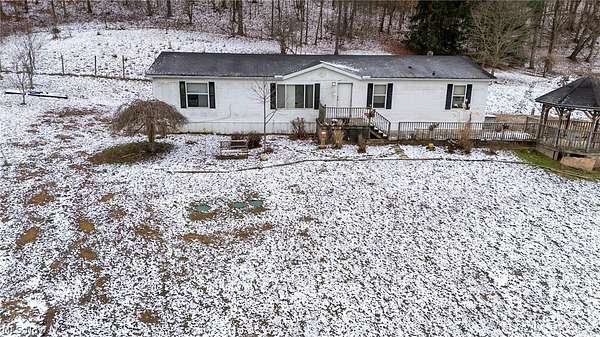 5 Acres of Land with Home for Sale in Pleasant City, Ohio