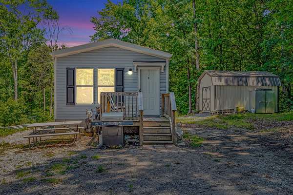 16.2 Acres of Land with Home for Sale in Cumberland Furnace, Tennessee