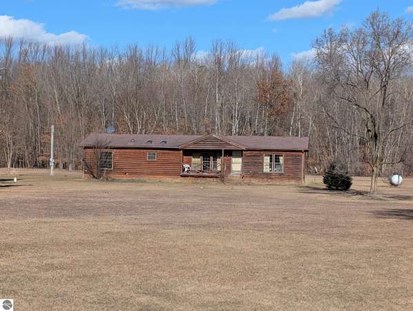 4 Acres of Land with Home for Sale in Riverdale, Michigan