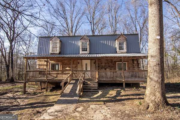 4.39 Acres of Land with Home for Sale in Lula, Georgia