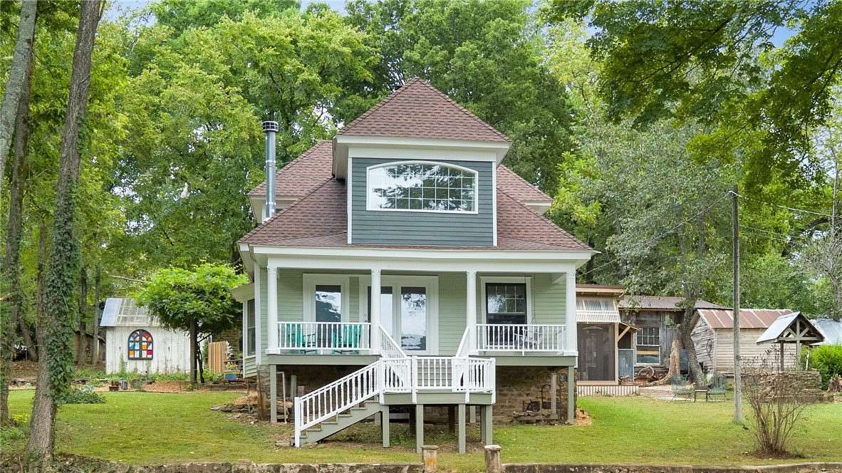 4.32 Acres of Land with Home for Sale in Elkins, Arkansas