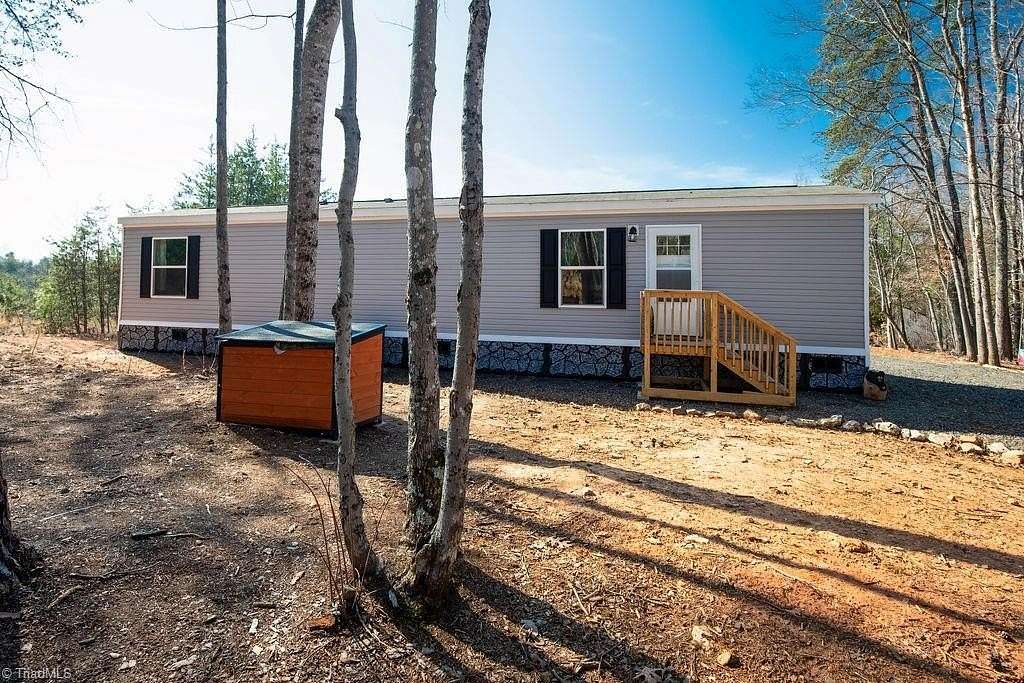 10.1 Acres of Recreational Land with Home for Sale in Mayodan, North Carolina