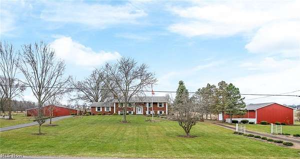 7.2 Acres of Land with Home for Sale in Louisville, Ohio