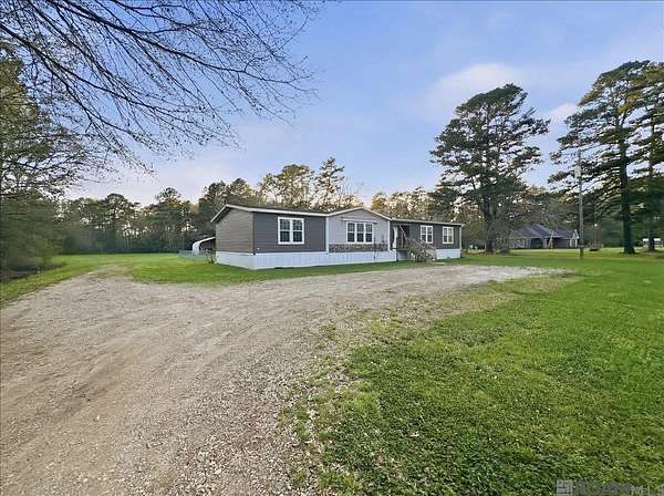 13.8 Acres of Land with Home for Sale in Pride, Louisiana