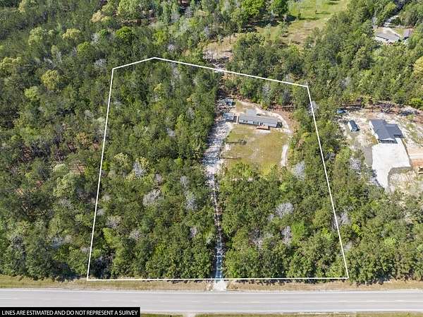 5.64 Acres of Land with Home for Sale in Brookeland, Texas