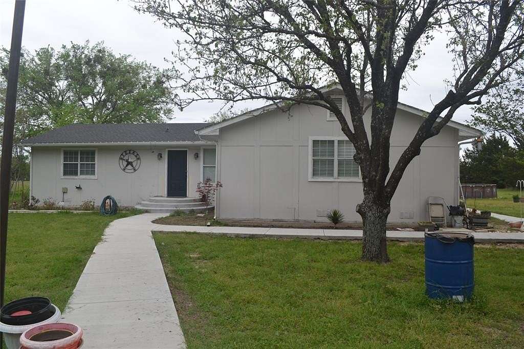 2 Acres of Land with Home for Sale in Quinlan, Texas