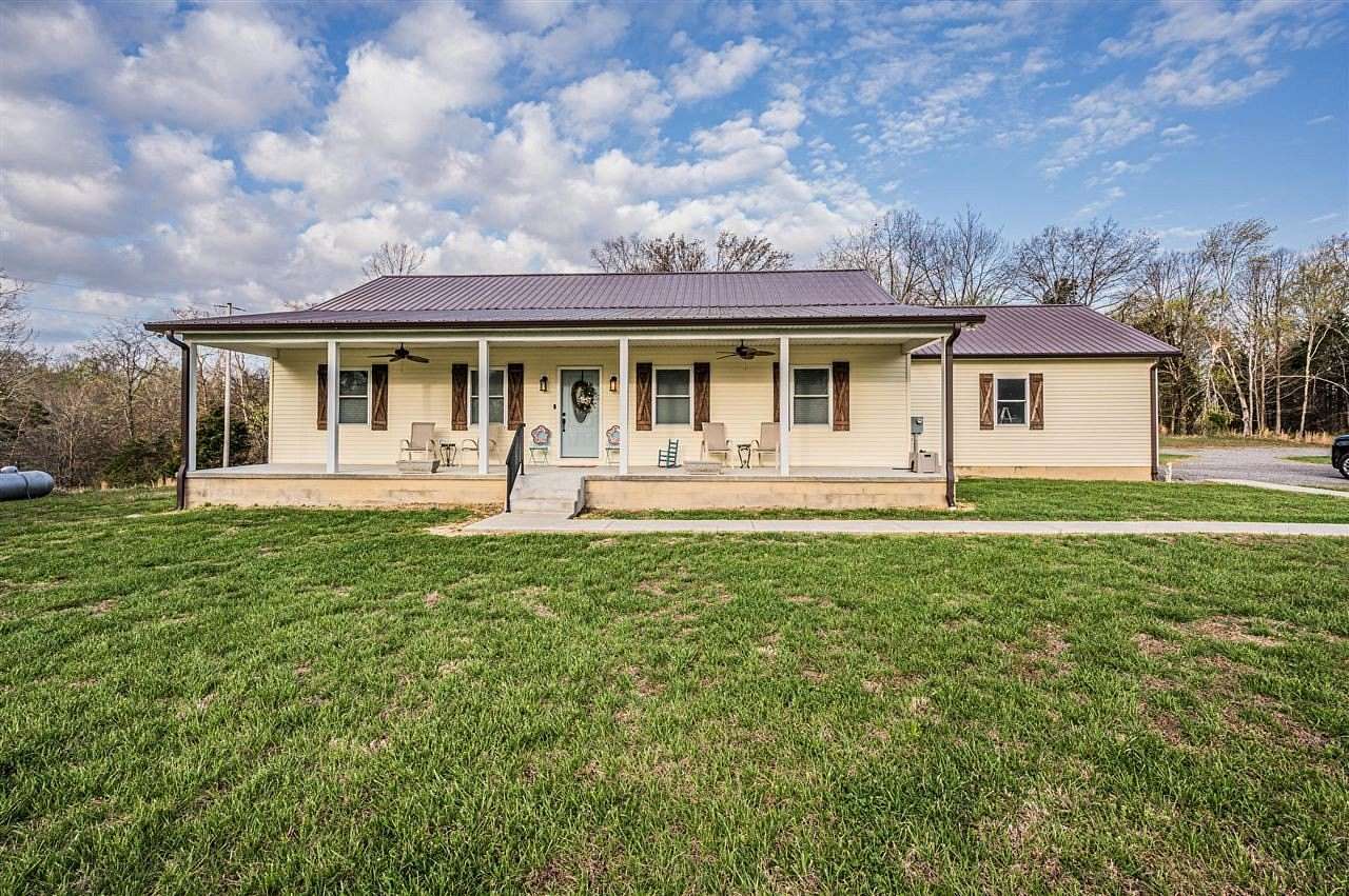 50.7 Acres of Land with Home for Sale in Adolphus, Kentucky