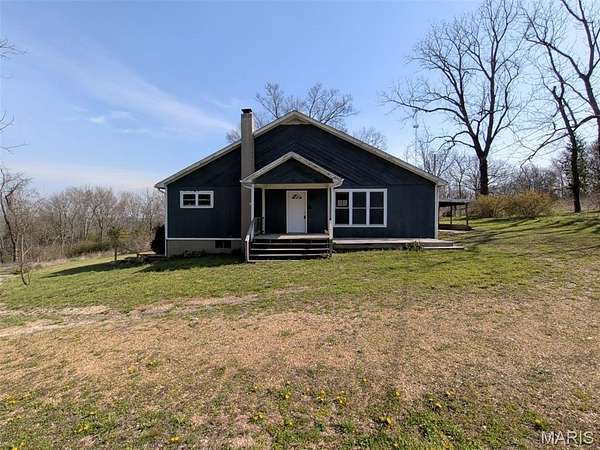 4.46 Acres of Land with Home for Sale in Hartville, Missouri