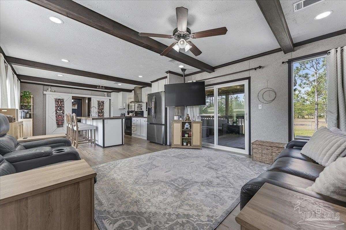 1.59 Acres of Land with Home for Sale in Milton, Florida