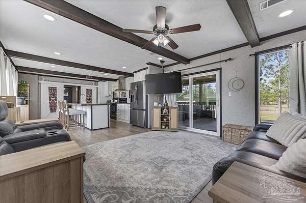 1.59 Acres of Land with Home for Sale in Milton, Florida