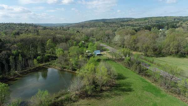 30 Acres of Land with Home for Sale in Magazine, Arkansas