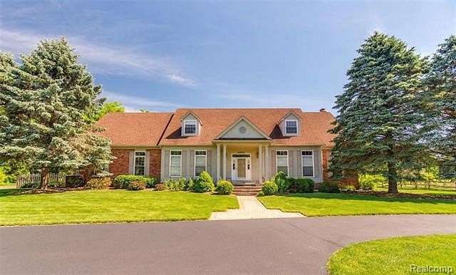 12.2 Acres of Land with Home for Sale in Groveland Township, Michigan