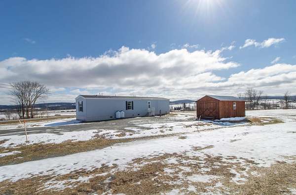 10.2 Acres of Recreational Land with Home for Sale in Newport Town, Vermont