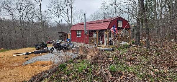 1.26 Acres of Land with Home for Sale in Holladay, Tennessee