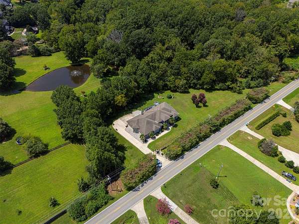 2.3 Acres of Land with Home for Sale in Matthews, North Carolina