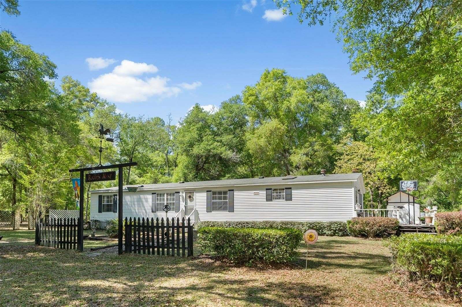 6.84 Acres of Land with Home for Sale in High Springs, Florida